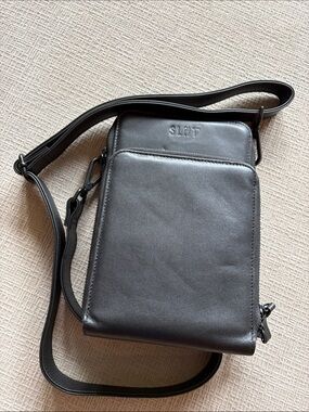 SLNT faraday black leather cross body bag